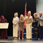Randy Johnston presented scholarships to two Palo Duro students in honor of the late Frontz M. Myatt, the longtime educator and track coach.